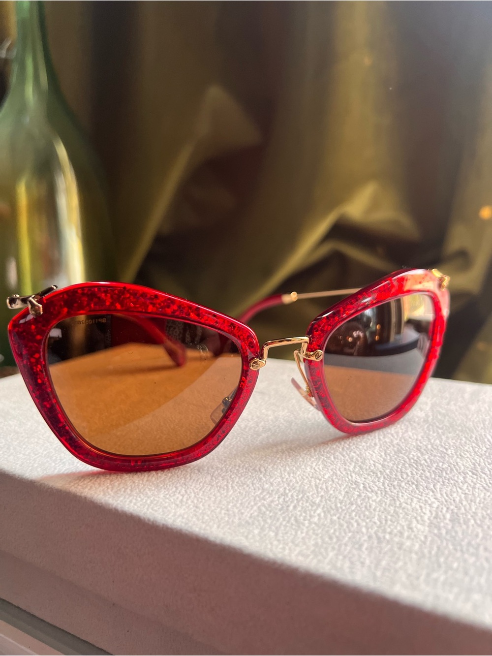 Miu Miu Red Glitter Cat-Eye Sunglasses with Brown Lenses SMU 10N